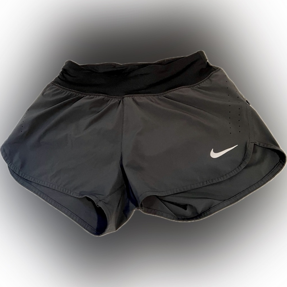 NIKE black running shorts with zipper pocket. Size SM.  Like new.